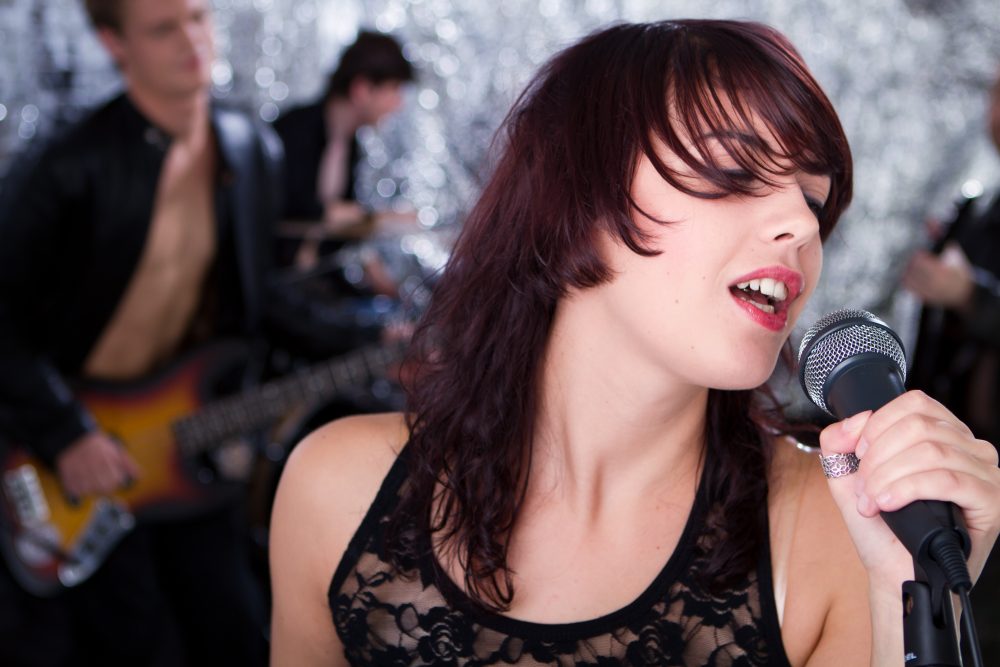 Can’t Decide Between A Live Wedding Band Or A DJ